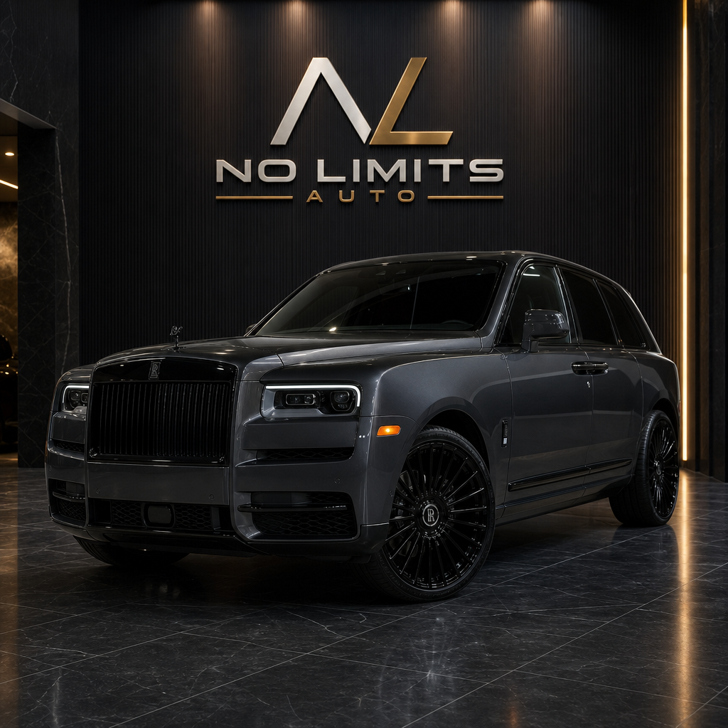 2024 Rolls-Royce Cullinan Black Badge in deep anthracite with blacked-out trim in an upscale showroom with the identical No Limits Auto wall logo treatment matching the new reference