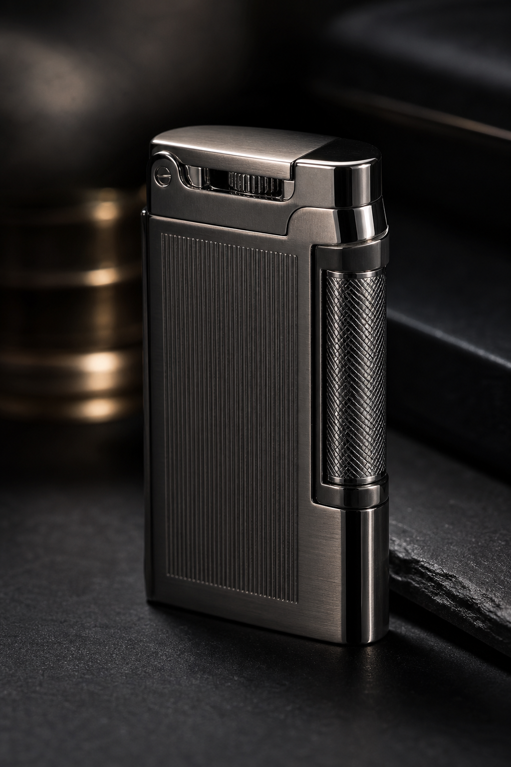 Close-up premium brushed-metal lighter with polished edges and subtle reflected highlights