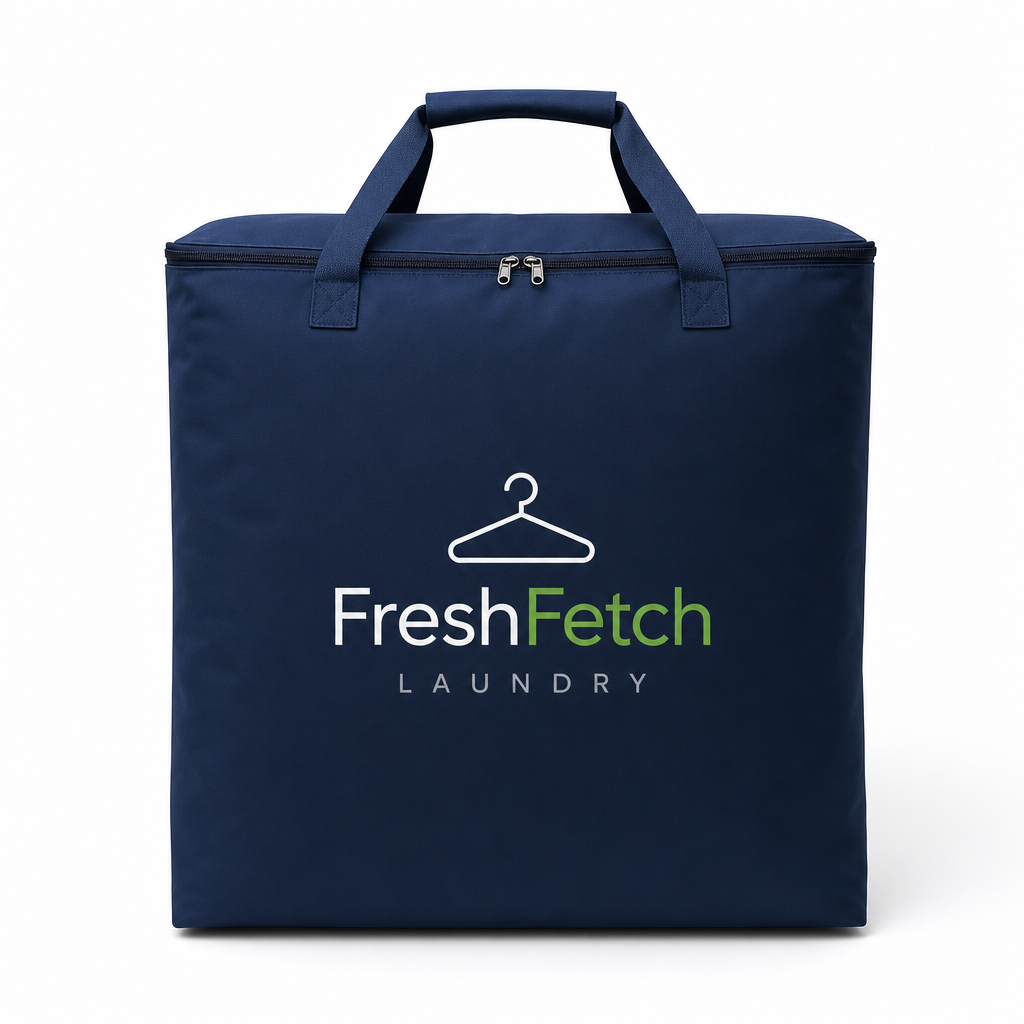 Extra large FreshFetch laundry bag in premium white canvas with structured shape and navy-green branding, photographed in a clean studio