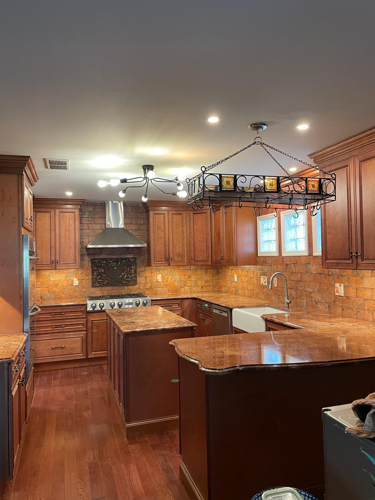 Kitchen remodel featuring a large island with seating