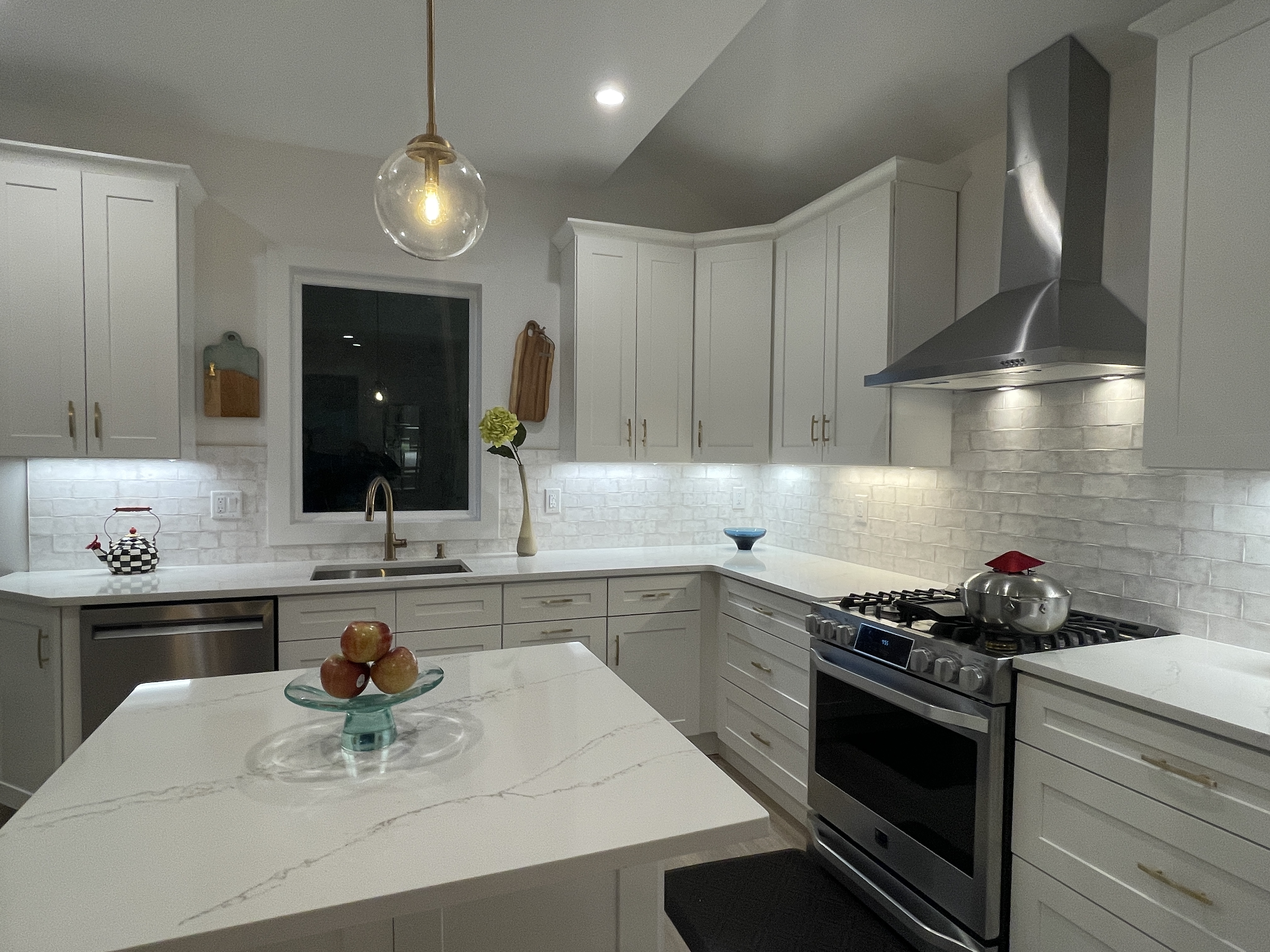 Modern kitchen with island and pendant lights