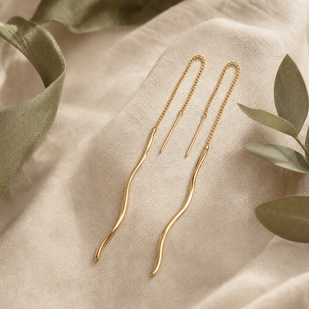 Long threader earrings with fluid movement.