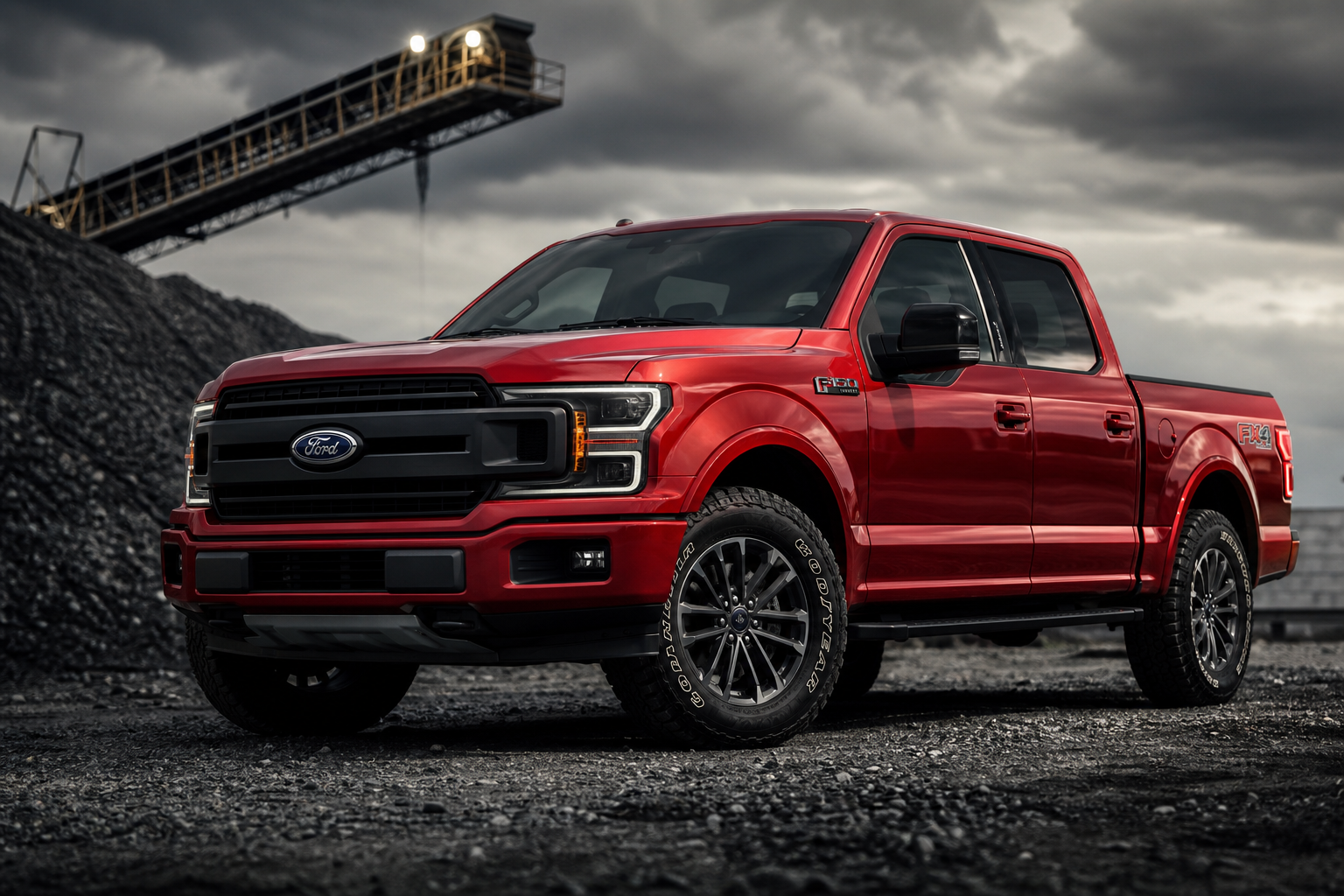 Red Ford F-150 truck parked on gravel with rugged lighting