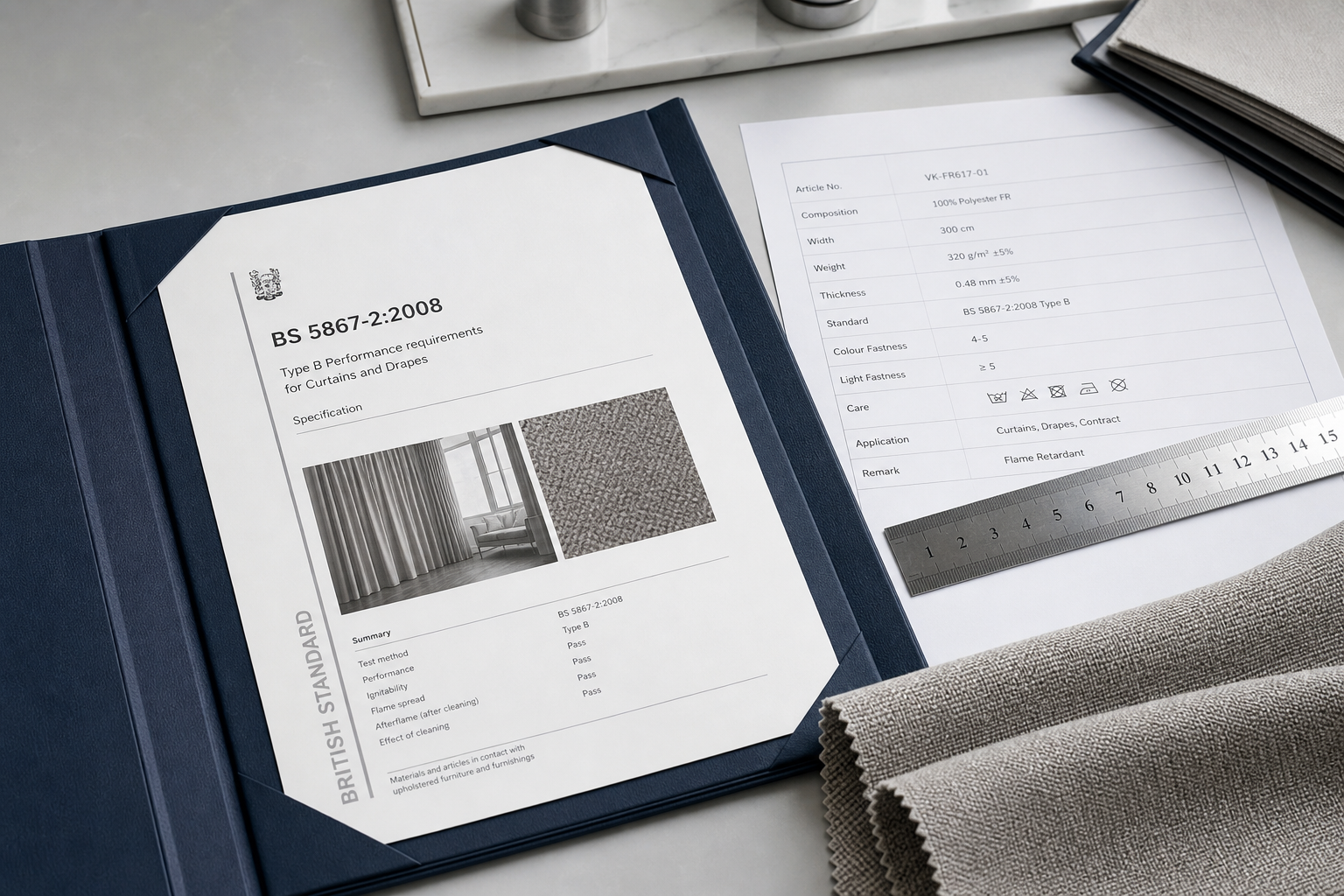 Certification folder with UK contract fire standard pages and technical notes on a clean desk