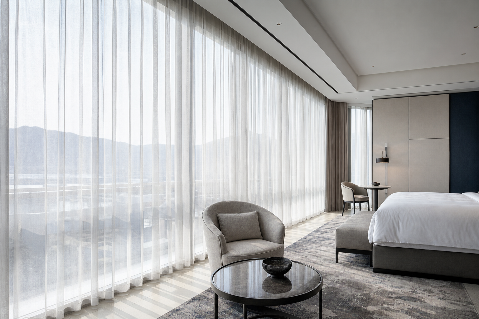 Lightweight hotel sheer curtain installation with soft daylight in a premium architectural guest room