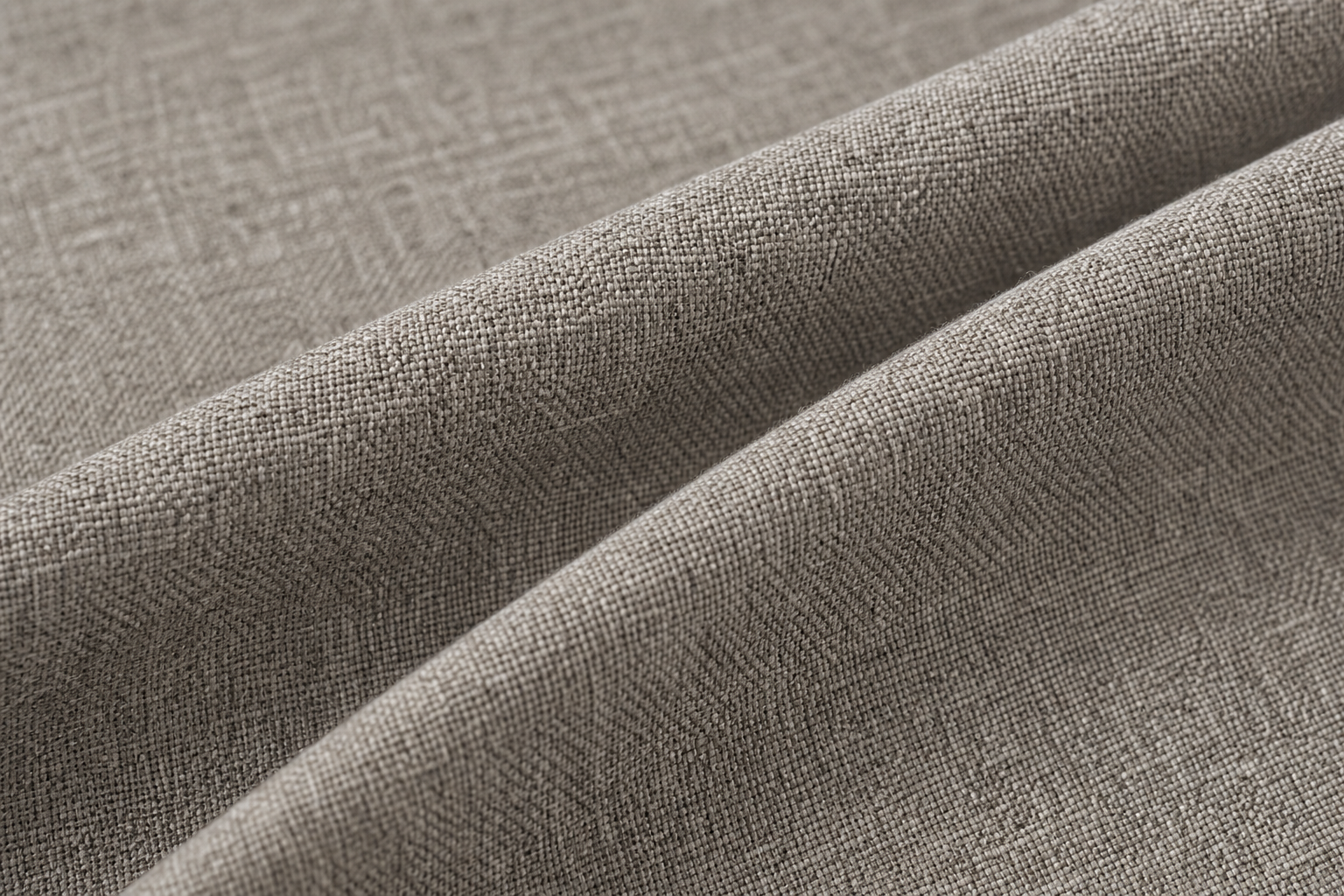 Macro view of warm stone-gray melange acoustic curtain fabric with soft matte face for interior comfort