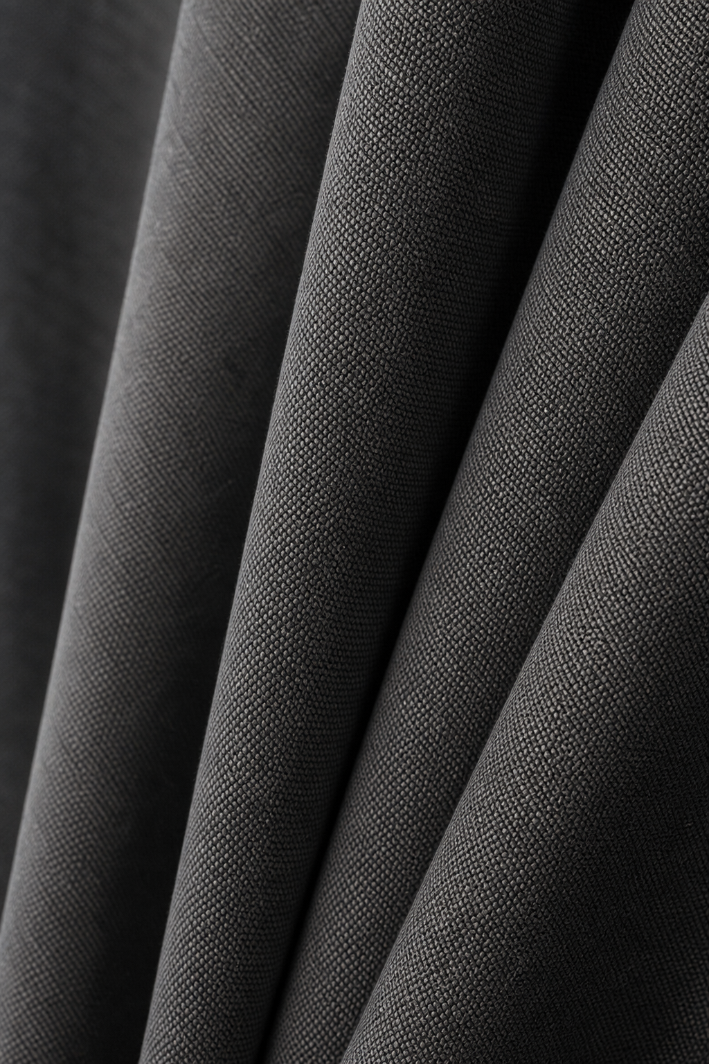 Dense heavyweight inherently flame-retardant curtain fabric with refined weave
