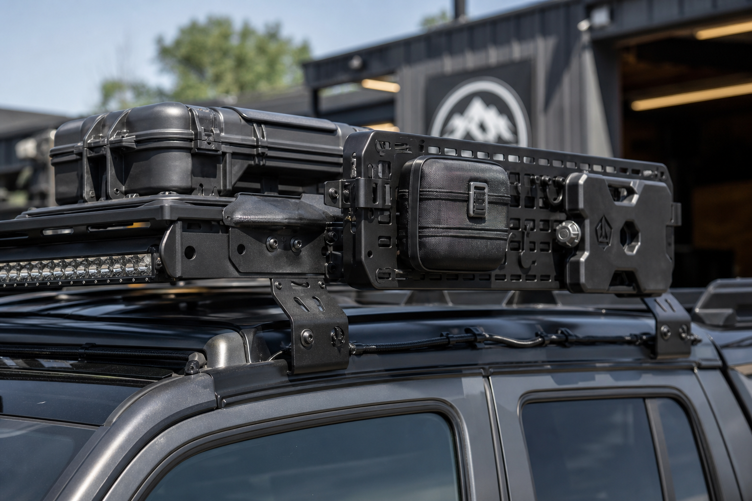Overland roof rack with securely mounted utility accessories and cable routing