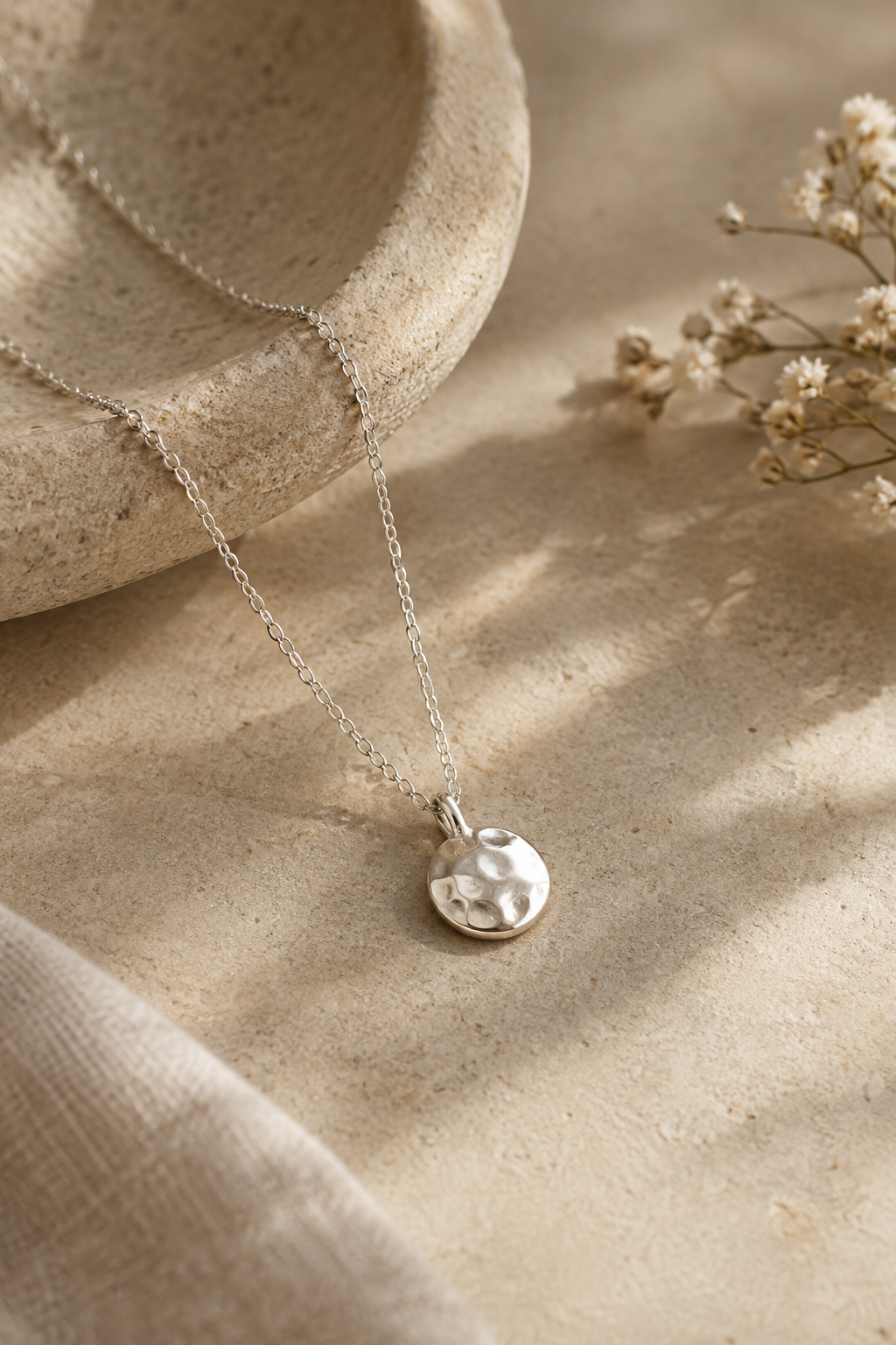 Fine sterling silver necklace with a small polished star pendant