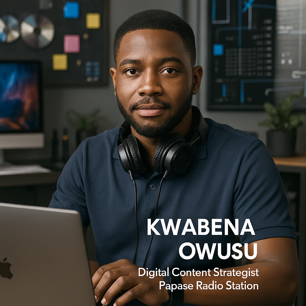 Kwabena Owusu, Digital Content Strategist, working on a laptop, with headphones around his neck.
