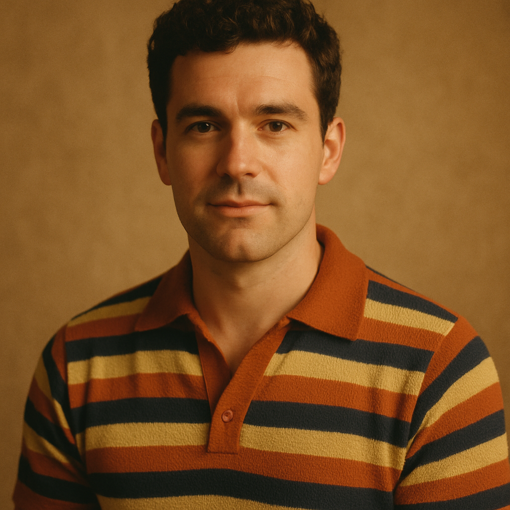 Portrait of a man with short curly dark hair in a striped retro shirt