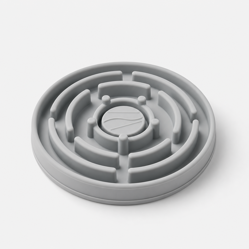 Round interactive silicone feeding toy in soft light gray with layered ridges