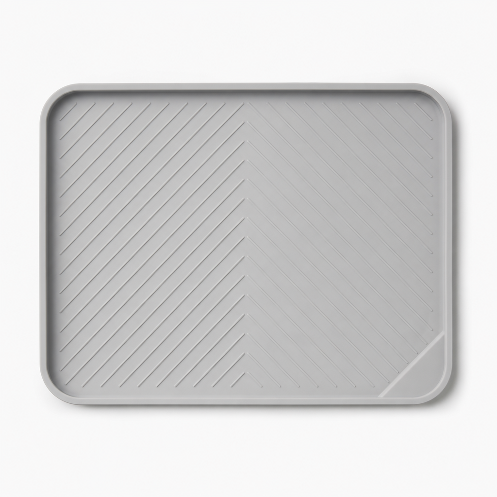 Minimalist light gray silicone feeding mat with raised edges
