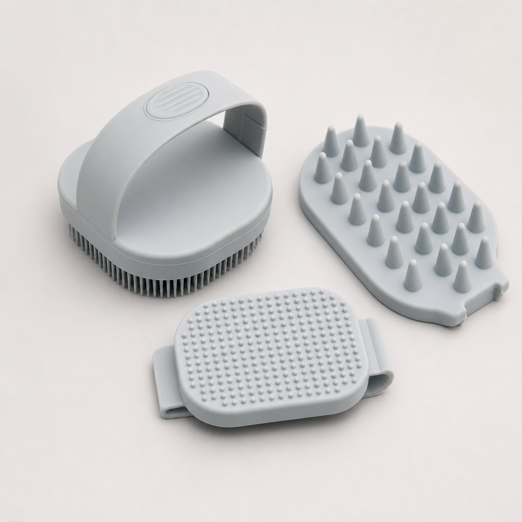 Minimalist silicone grooming tool kit in light gray with three modular pieces