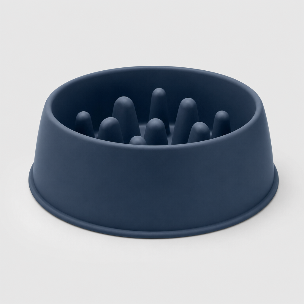 Deep-profile silicone slow feeder bowl in matte midnight blue with tall inner ridges, photographed on a clean light gray background.