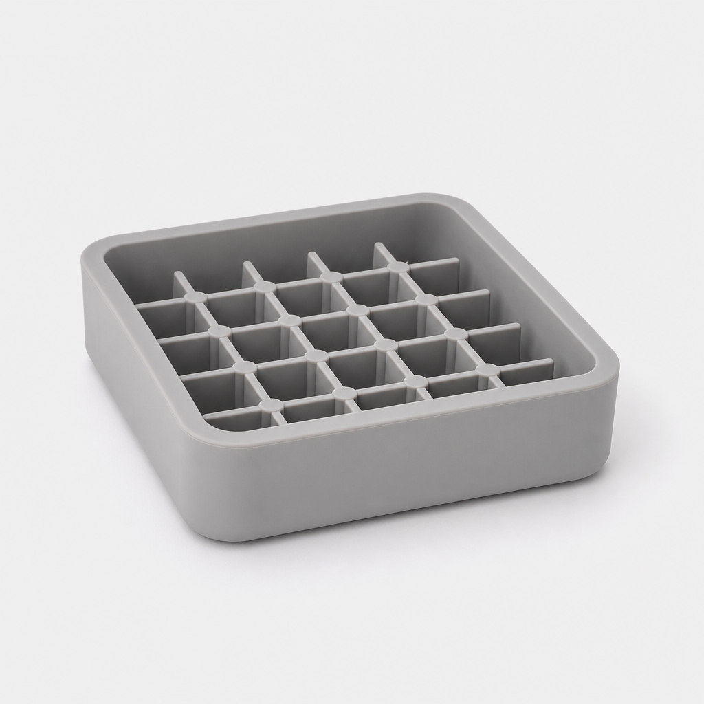 Square silicone slow feeder bowl in soft ash gray with grid ridges, photographed on a clean light gray background.